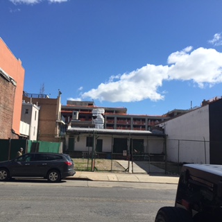 1,600 SF Storage + 8,000 SF Vacant Land